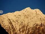 16 Moon and Sunrise On Pemthang Karpo Ri Close Up From Drakpochen The moon highlights sunrise on Pemthang Karpo Ri from Drakpochen